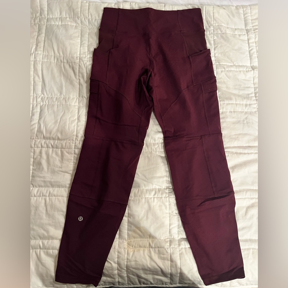 Lululemon yoga workout pants. Cargo style. Zip ankles. Burgundy color. Size 6.